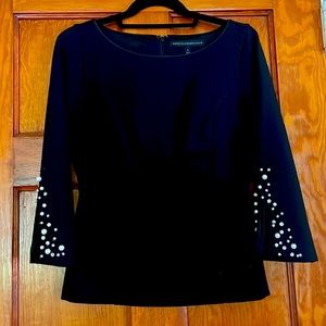White House Black Market top with pearls and beads on the sleeves.